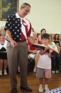 Bobby Watkins and son Taylor sport seasonal outfits at the 2014 Henagar-Union Convention. Photograph by Martha Beverley.